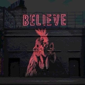 The image shows a large mural painted on the side of a building. The mural features a rooster's head and part of its body, rendered in shades of pink and red. The rooster's head is prominently displayed, with its beak and comb visible. The rooster's head is positioned slightly to the left of the center of the mural. Th
