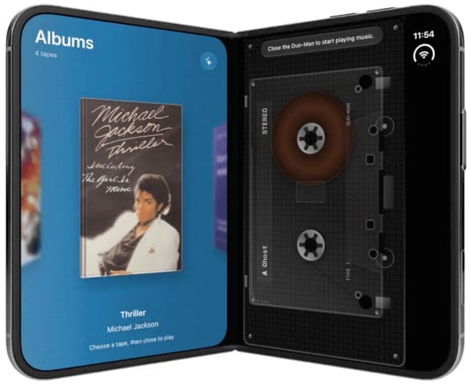 The image shows a black smartphone with a unique design, folded in half to reveal a cassette tape. The phone's screen displays a blue background with the word "Albums" and the number "4" indicating the number of albums. The cassette tape is black with a brown label and features a white label with the word "Thriller" an