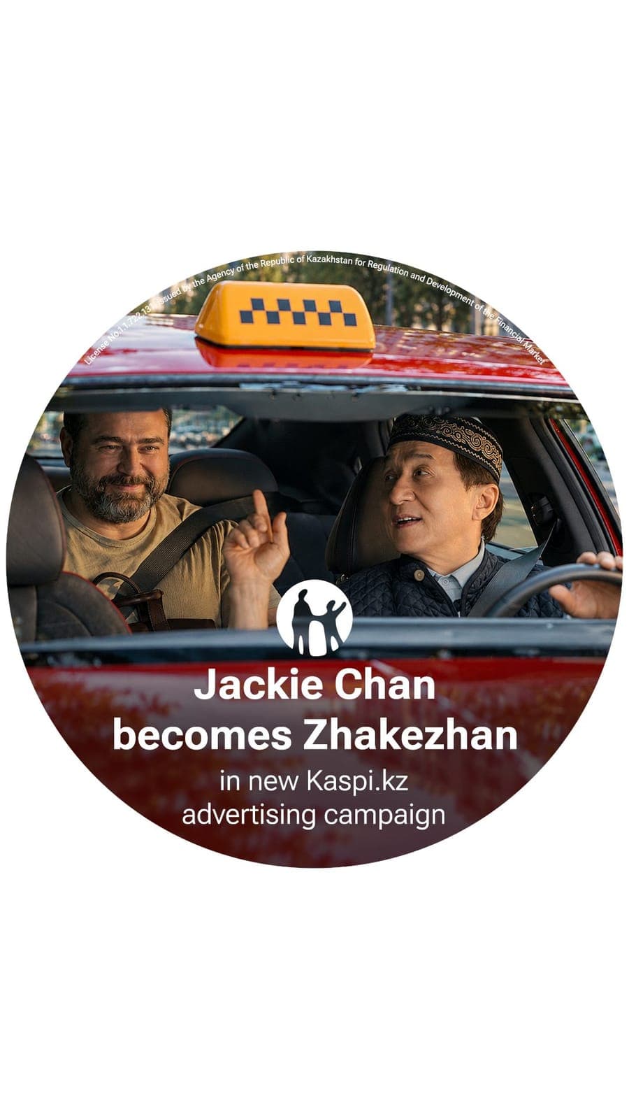 The image shows a red car with a yellow taxi sign on top, driving on a road. The car is occupied by two men, one of whom is wearing a beige shirt and the other a dark-colored jacket. The man in the beige shirt is holding the car door open, while the man in the dark-colored jacket is driving. The car is positioned in fr