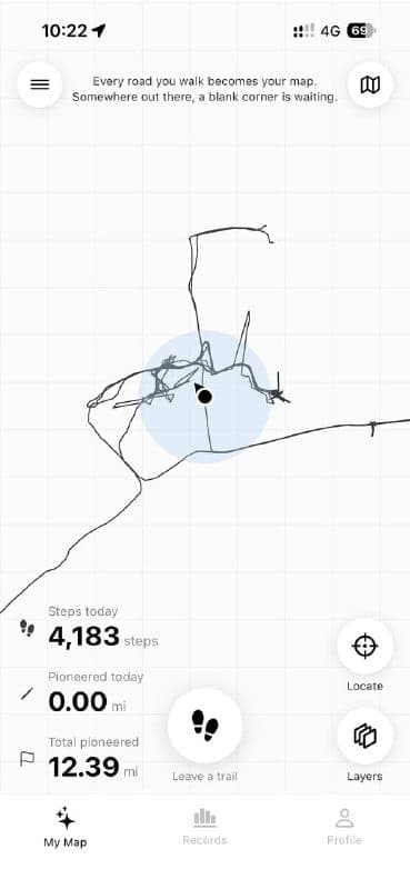The image shows a fitness tracking app on a smartphone screen. The top of the screen displays the time as 10:22 and the battery level as 40%. The app interface is primarily black and white, with a light blue circle in the center of the map. The map shows a path, likely a walking route, with a small black dot at the cen