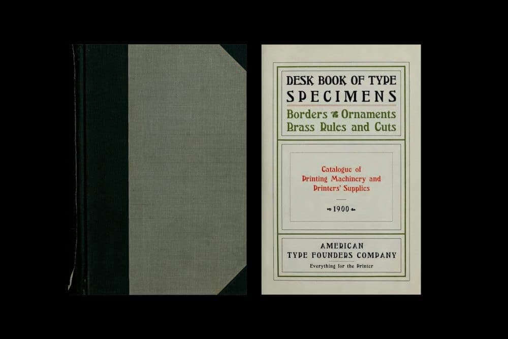 The image shows a book titled "Desk Book of Type Specifications: Borders, Ornaments, Brass Rules and Cuts" by the American Type Founders Company. The book cover is primarily off-white or cream-colored with a dark green or black spine. The title is written in bold, black text, and the subtitle "Catalog of Printing Machi
