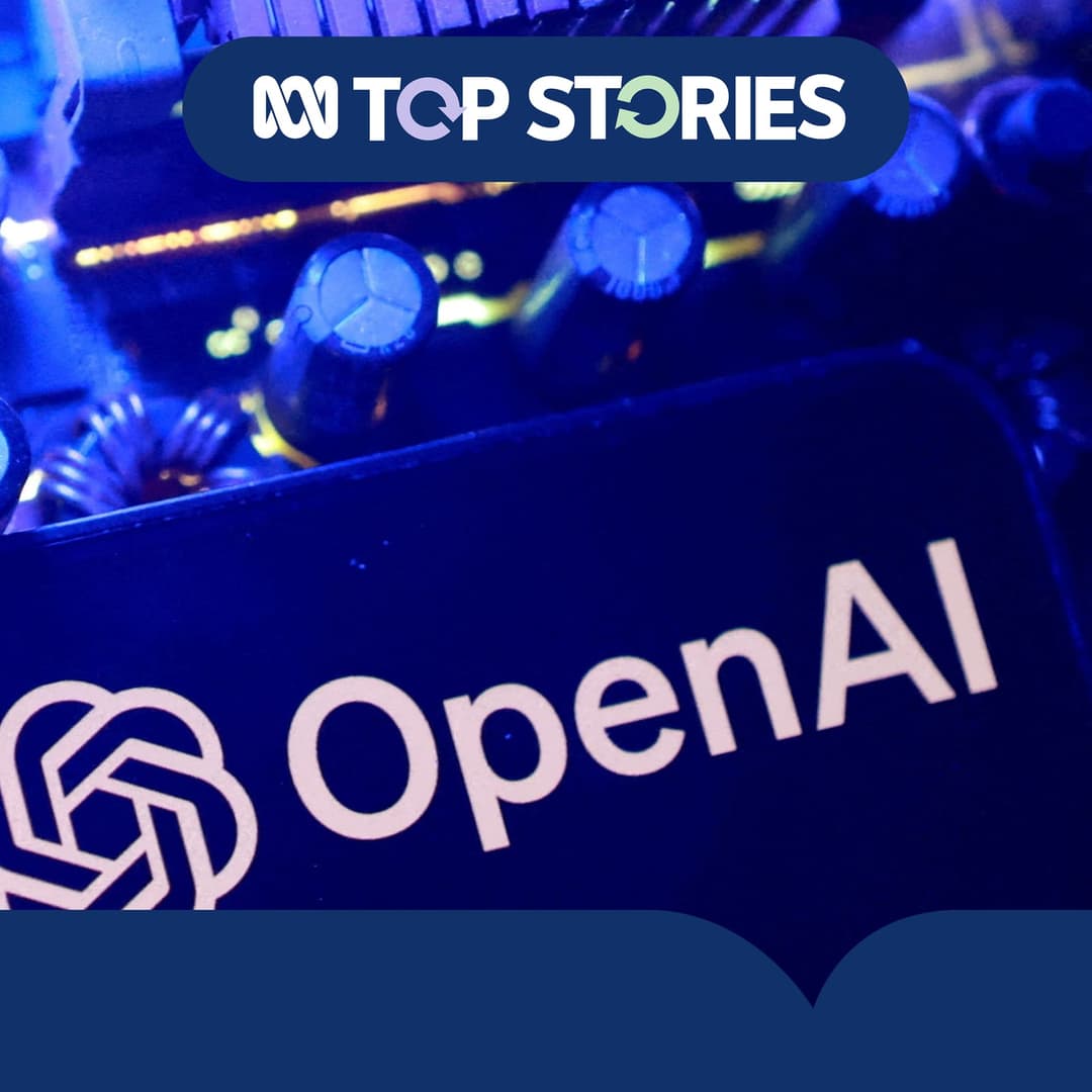The image shows a close-up view of a computer circuit board, illuminated by blue light. The circuit board features several small, round components, possibly capacitors, and is partially obscured by a dark blue or black object. The circuit board is the central focus of the image, with the text "OpenAI" prominently displ