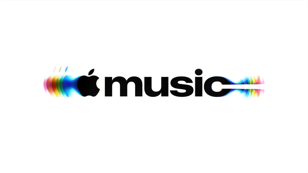 The image features the Apple logo, a black silhouette of the iconic apple, positioned on the left side. The word "music" is written in bold, black letters in the center of the image, with a stylized wave-like effect extending from the right side of the word. The wave-like effect is composed of a gradient of colors, inc