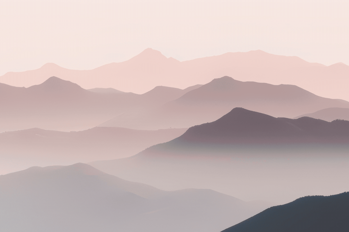 The image presents a serene landscape dominated by a mountain range. The mountains, rendered in shades of pink and purple, are depicted in a silhouette style, creating a sense of depth and dimension. The mountains are layered, with the tallest peaks in the background and the shortest in the foreground, giving a sense o
