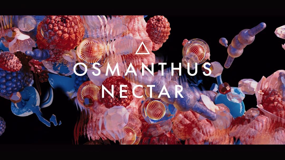 The image presents a vibrant and abstract composition of various shapes and colors, including spheres, spheres, and other organic forms, against a stark black background. The shapes are arranged in a way that creates a sense of depth and movement, with some appearing to float or be suspended in mid-air. The colors are