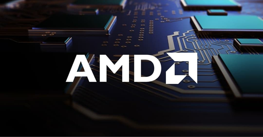 The image presents a close-up view of a computer circuit board, with the AMD logo prominently displayed in the center. The circuit board is a complex network of interconnected components, primarily in shades of blue and black, with gold/yellow accents. The AMD logo, a stylized white arrow pointing upwards, is positione