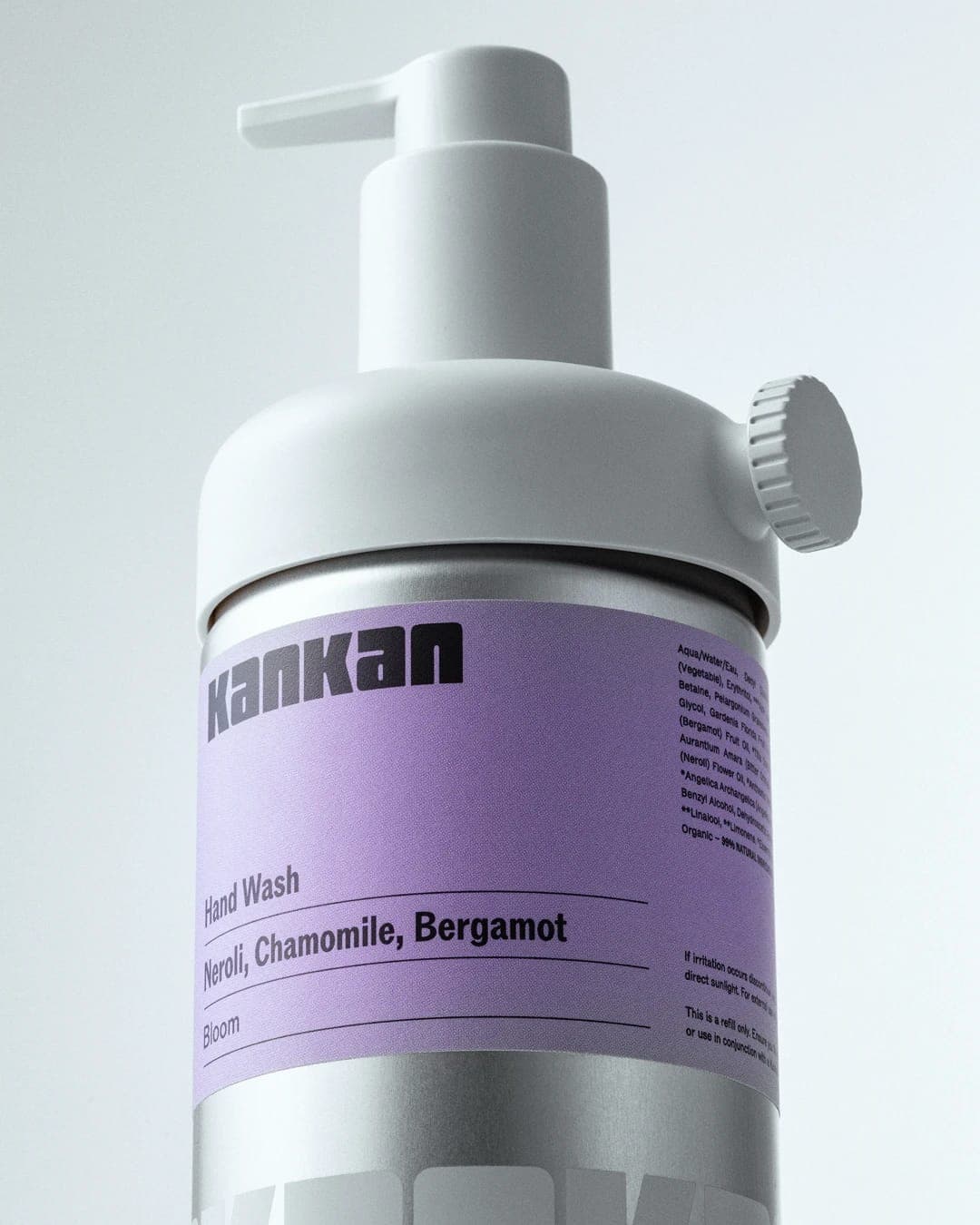 The image shows a white pump bottle of Kankan hand wash against a white background. The bottle has a silver/grey metallic finish and features a white label with black text. The label displays the brand name "Kankan" in a bold, black font, and the product name "Hand Wash" in a smaller, black font. The product name "Nero