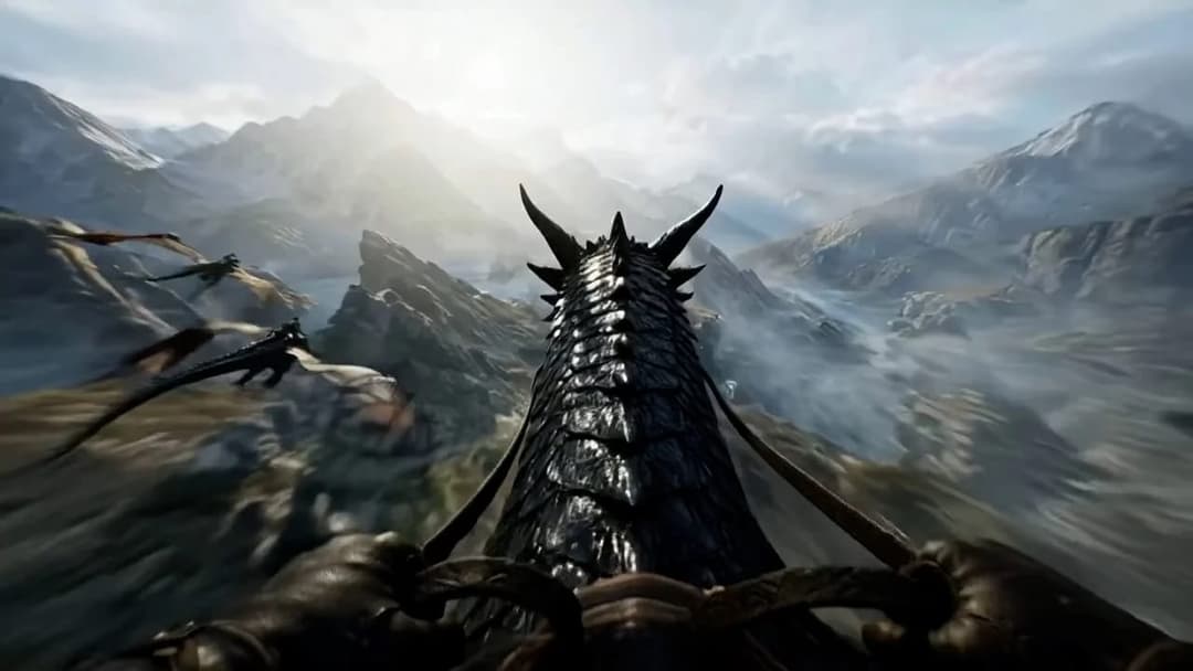 A first-person view from atop a dragon with spiked horns and dark armored scales flies over snowy mountains, with another dragon visible at the left. It appears to be a video game screenshot, and no legible text is visible.