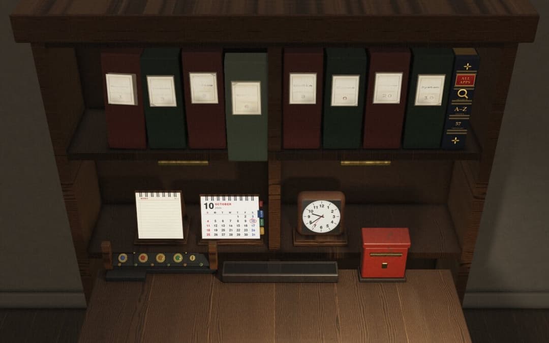 The image shows a wooden desk with a dark brown finish, situated against a gray wall. The desk features a black clock, a red box, a black calculator, and a white calendar with black text. Above the desk, a wooden bookshelf with two shelves holds a collection of books and binders in various colors, including green, burg