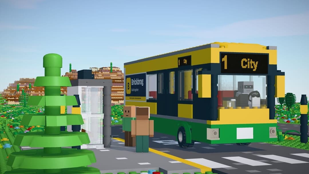 The image depicts a vibrant city scene with a yellow and green bus labeled "1 City" parked at a bus stop. The bus stop is constructed from Lego bricks, and a Lego figure is standing near it. A Lego tree is also present in the scene. The cityscape in the background features buildings in shades of brown and orange, and a