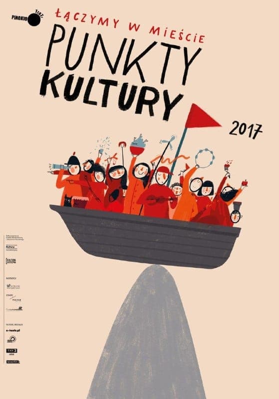 The image is a poster for the 2017 Punkty Kulture festival. The poster features a vibrant illustration of a group of people in a boat, with a red flag at the back. The boat is depicted in a dark gray or black color, and the people are dressed in a variety of colorful clothing. The background of the poster is a light be
