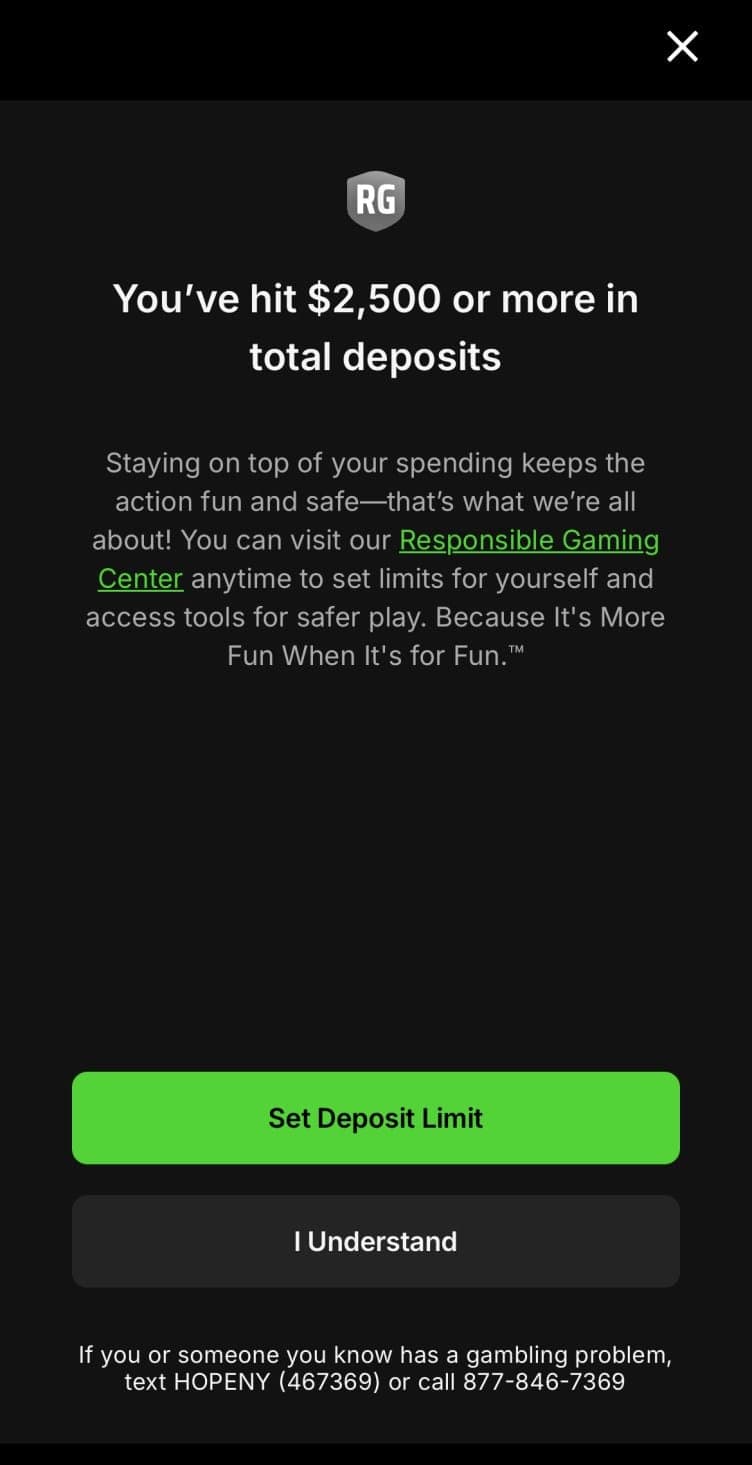 The image shows a mobile app interface with a dark gray background. At the top, a logo for "RG" is displayed. The main text of the app announces that the user has hit $2,500 or more in total deposits. Below this, a message from the Responsible Gaming Center encourages users to set limits for themselves and access tools