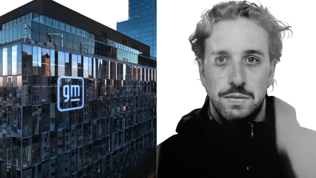 The image is a composite of two distinct photographs. On the left, a modern building with a glass facade reflects the surrounding cityscape, including a tall blue skyscraper. The building prominently displays the GM logo in white. On the right, a black and white portrait of a man with curly hair and a beard is shown. T