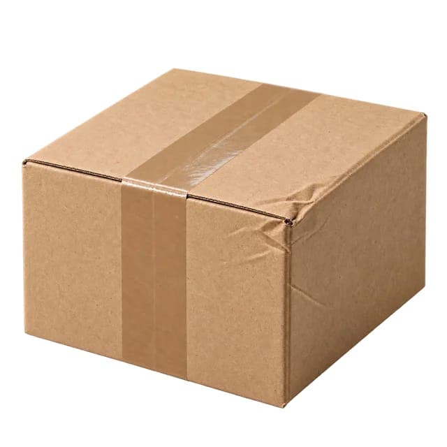 The image shows a single cardboard box resting on a black background. The box is a light brown color and is sealed with a brown tape strip running down its center. The box has a slightly curved top and bottom, and a small tear or damage is visible on the top right corner. The box is positioned at a slight angle, with t