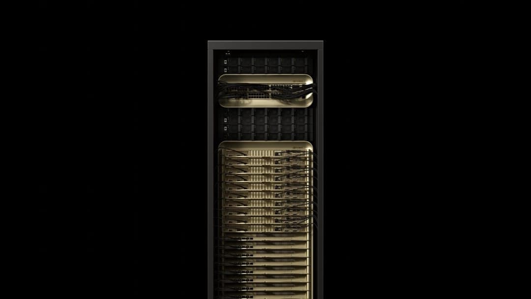 The image shows a server rack with a black frame and a gold-colored interior. The rack is divided into multiple compartments, each containing a series of black cables. The compartments are arranged in a vertical line, creating a sense of symmetry. The topmost compartment is slightly larger than the others, and the cabl