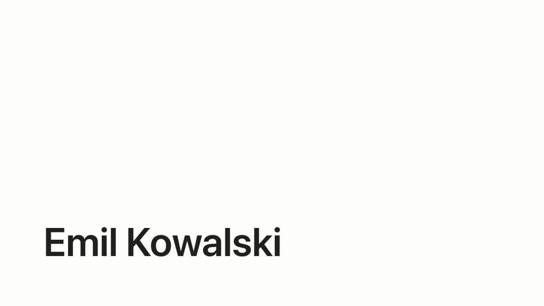 The image presents a minimalist design with a stark white background. Centered on the left side is the text "Emil Kowalski" written in black.